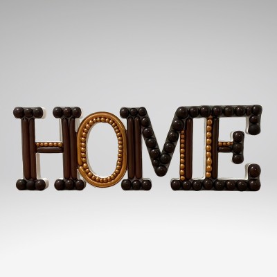 "HOME" napis Nikoloon okvir